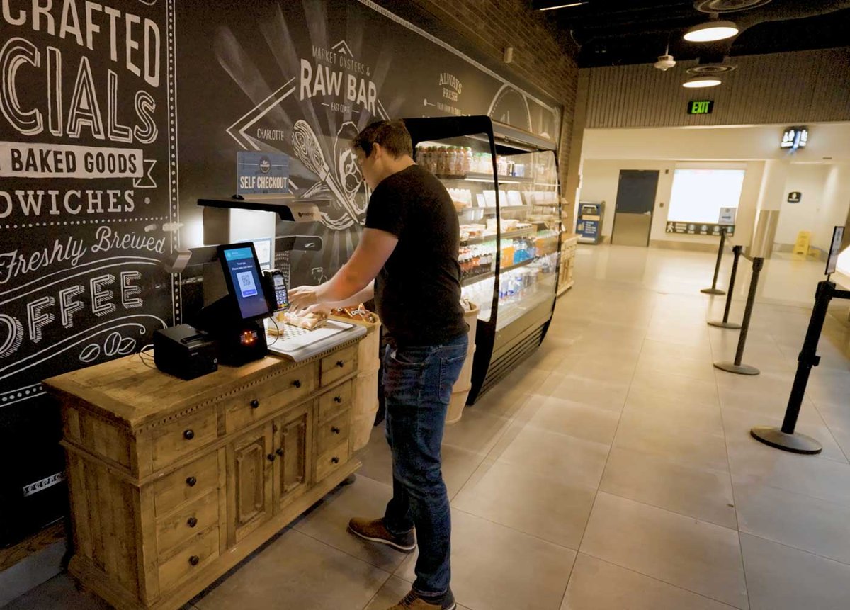 Man uses Mashgin at 1897 in Charlotte Douglass International Airport