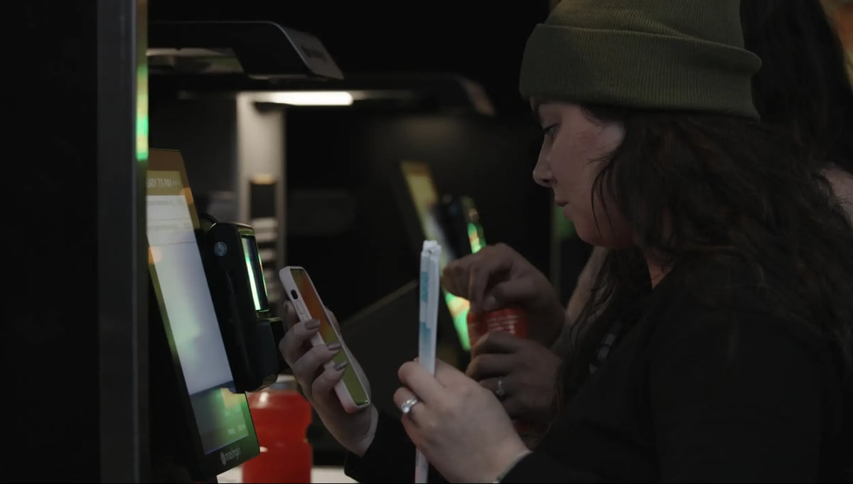 Two LAFC fans check out with Mashgin