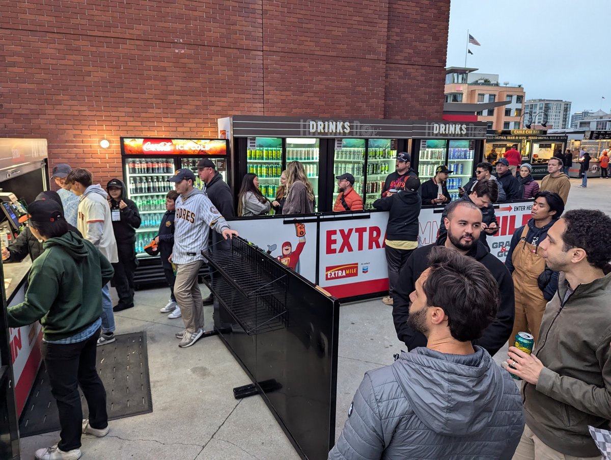 Fans run through the Mashgin stand at the home of the SF Giants.