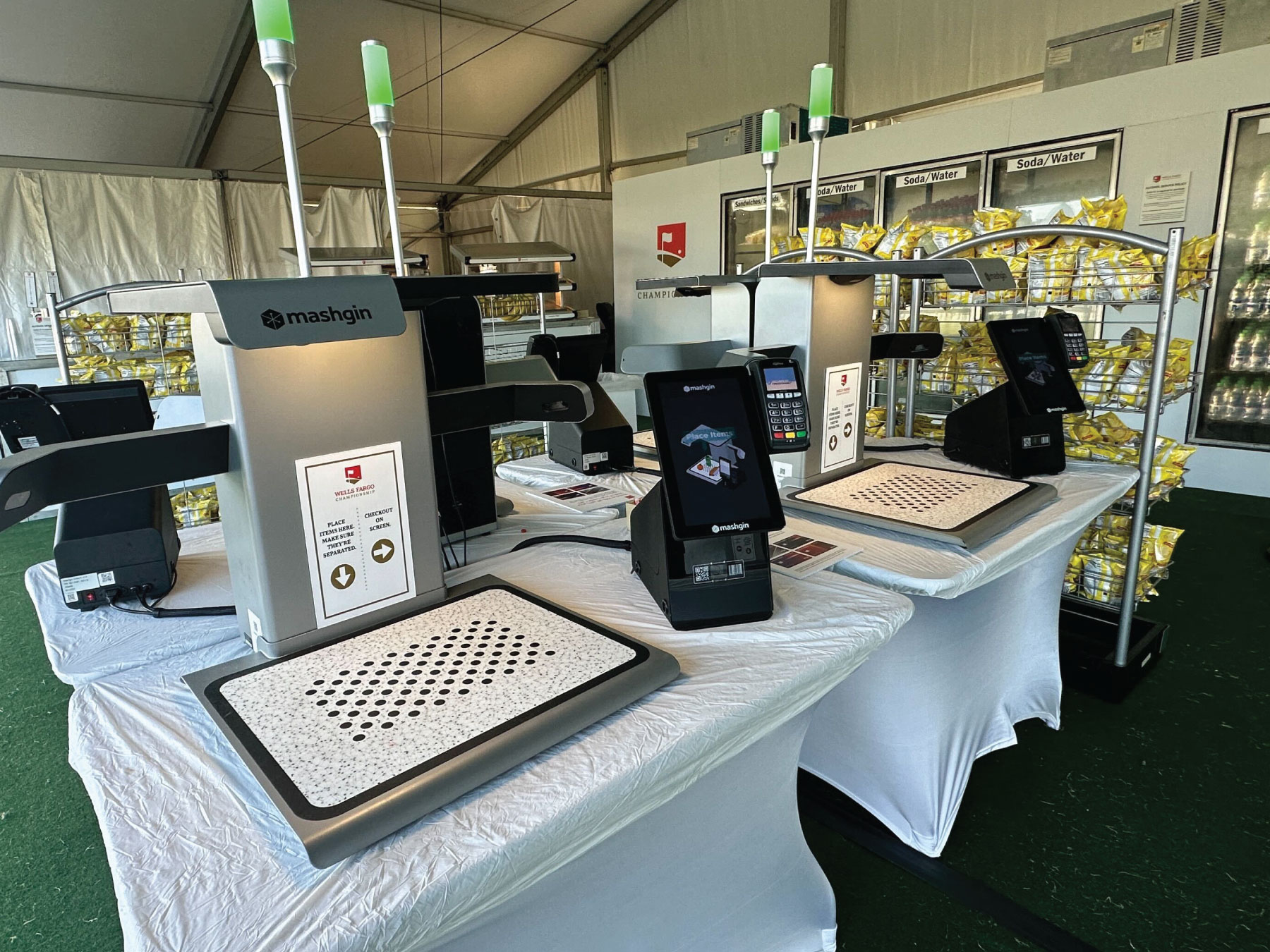 Four Mashgin kiosks are arrayed in a grab-and-go eatery